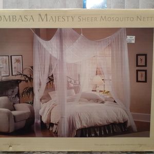 Sheer mosquito netting canopy.